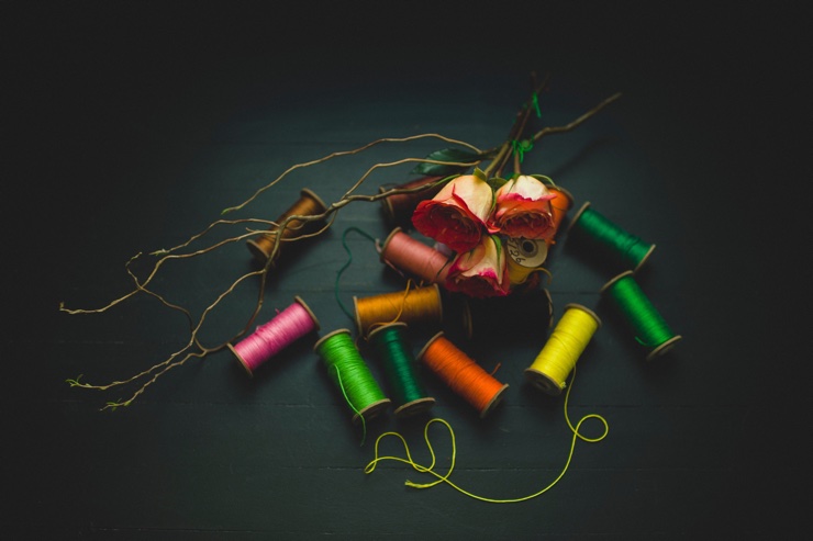 Bobbins with different coloured thread