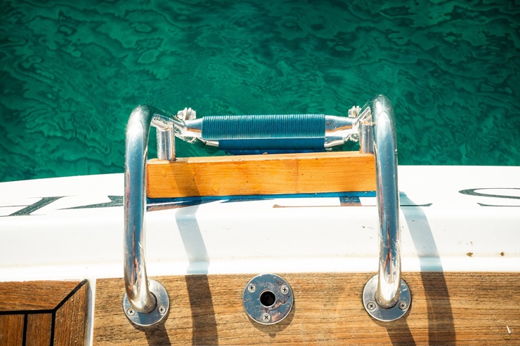 Stock photo of boat ladder and cool blue sea