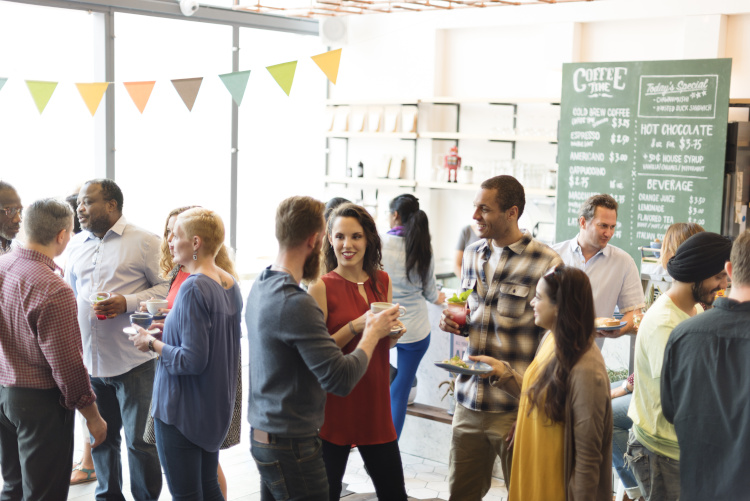 A relaxed networking event hosted in a coffee shop