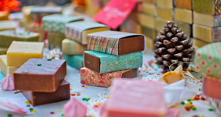 A number of soaps stockpiled in colourful wrappings