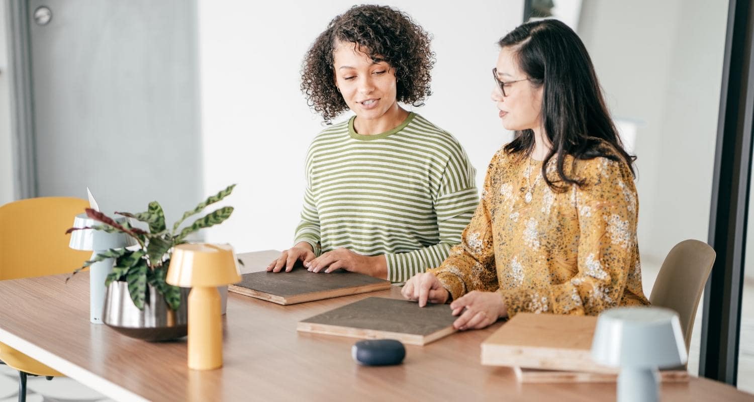 Two People Discussing Product Samples