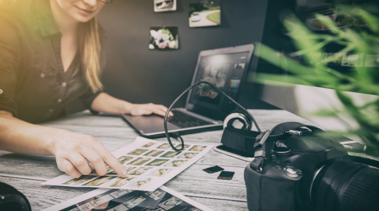 A person at their desk sorting and optimising images