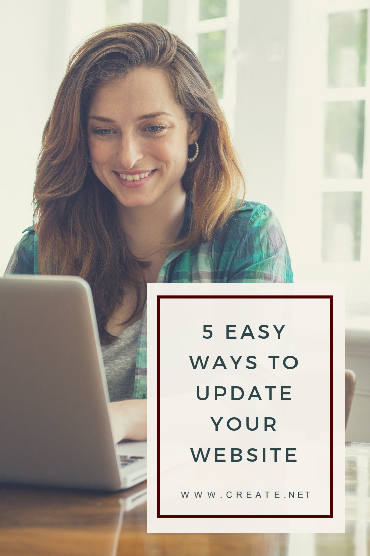 Woman smiling as she updates her website