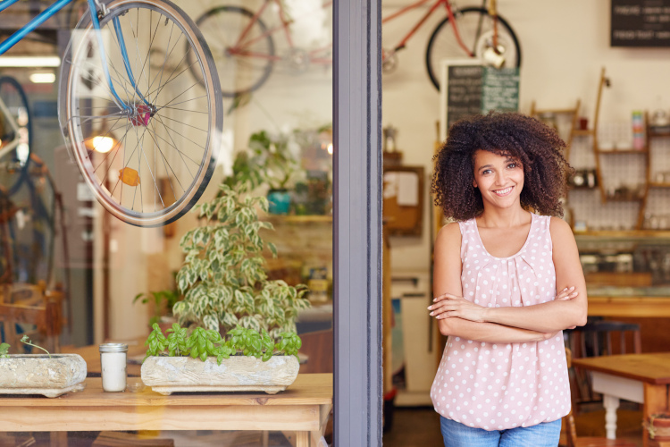 Small Business Owner in Bike Shop Window